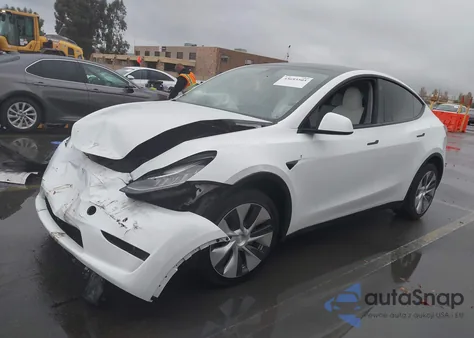 2023 Tesla Model Y Awd/Long Range Dual Motor All-Wheel Drive z USA, uszkodzony, nr VIN 7SAYGDEE7PA091564